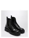 Prada Brushed Leather Ankle Boot For Men In Black