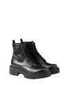 Prada Brushed Leather Ankle Boot For Men In Black