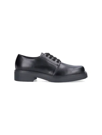 Prada Men Brushed Leather Derby In Black