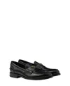 Prada Triangular Plaque Loafers In Black
