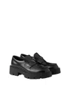 Prada Monolith Brushed Leather Loafers In Black