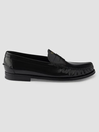 Prada Men's Brushed Leather Loafers In Black