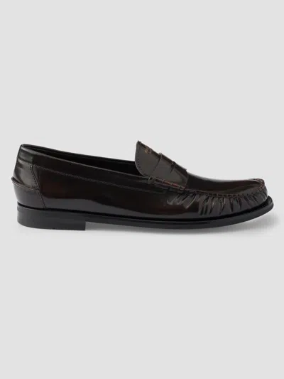 Prada Men's Brushed Leather Loafers In Black