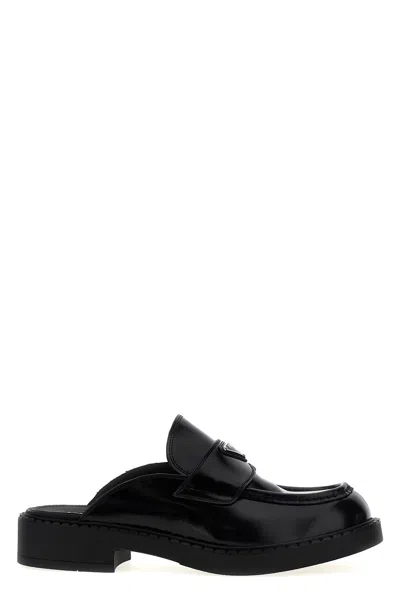 Prada 三角形logo皮质穆勒鞋 In Black