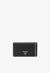 Prada Mini Leather Crossbody Bag In Black
