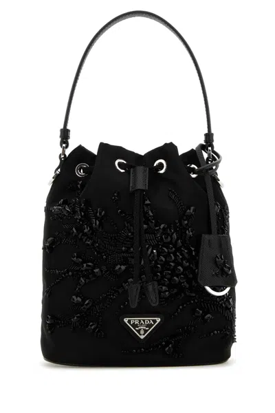 Prada Mini Nylon Bucket Bag With Adjustable Shoulder Strap In Brown