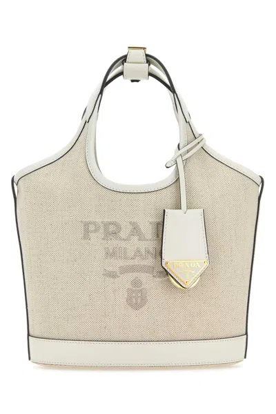 Prada Mini Sand Canvas Handbag With Golden Metal Hardware In White