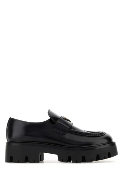 Prada Brushed Leather Loafers With Enameled Triangle Logo And 50 Mm Monoblock Rubber Sole In Black