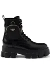 Prada Monolith Leather And Re-nylon Boots With Pouch In Black
