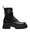 Prada Monolith Brushed Leather And Nylon Boots In Black