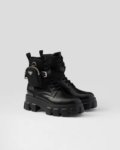 PRADA MONOLITH LEATHER AND RE-NYLON COMBAT BOOTS WITH POUCH