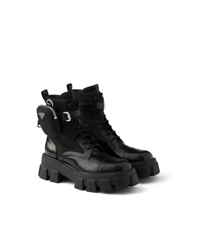 Prada Monolith Leather And Re-nylon Booties With Pouch In Black