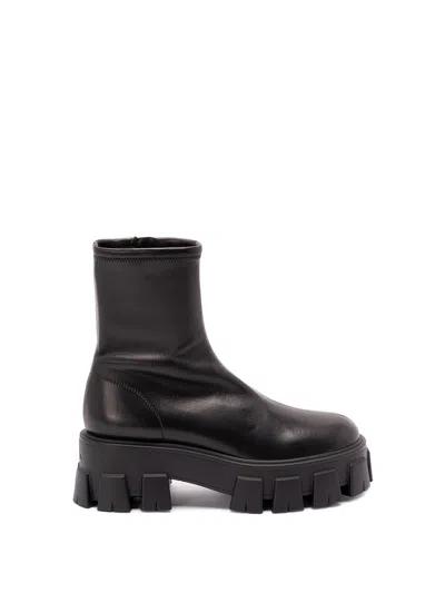 PRADA `MONOLITH` LEATHER ANKLE BOOTS
