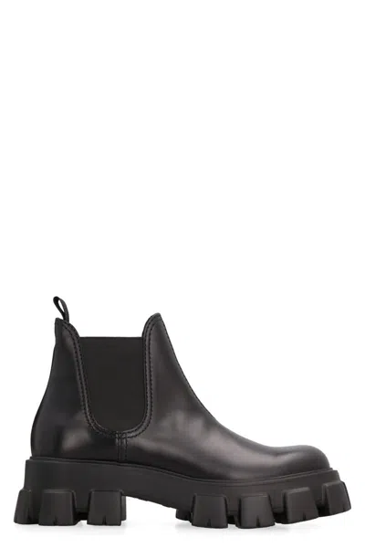 Prada Monolith Leather Ankle Boots In Black