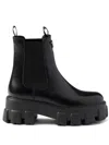 Prada Monolith Brushed Leather Chelsea Boots In Schwarz