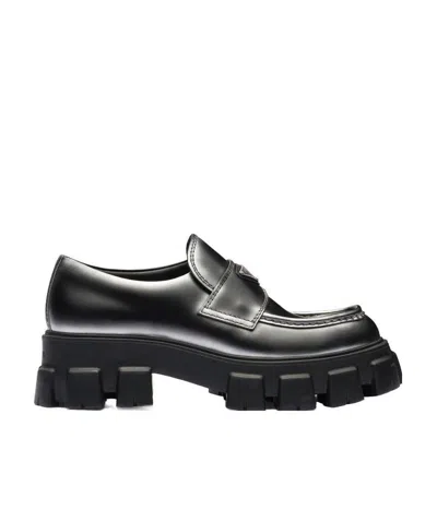 Prada Monolith Nuanced Leather Loafers In Black