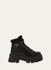 Prada Monolith Nylon Shearling Hiker Boots In Nero