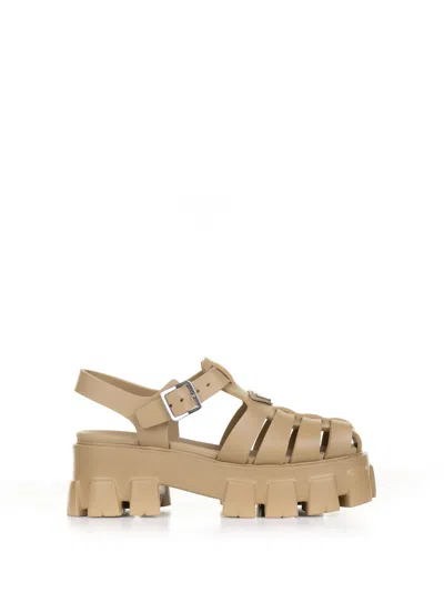 Prada Monolith Rubber Sandals In Orzo