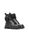 Prada Monolith Brushed Leather And Nylon Boots In Black
