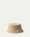 Prada Montone Shearling Bucket Hat In F03w3 Ecru 1