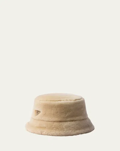 PRADA MONTONE SHEARLING BUCKET HAT
