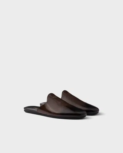 PRADA MULES AUS GEBÜRSTETEM LEDER