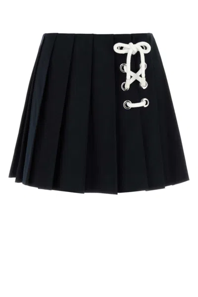 PRADA NAVY PLEATED DRILL MINI SKIRT