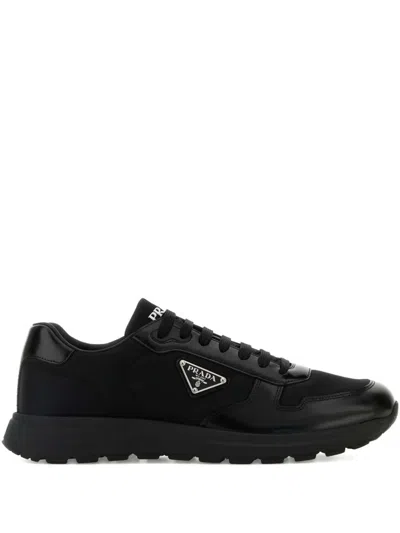 Prada Side Triangular Logo Low-cut Laced Casual Sneakers In Nero