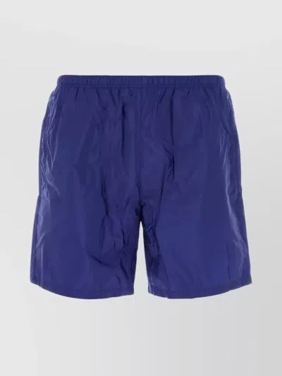 PRADA NYLON SWIM SHORTS WITH BACK POCKET AND ELASTIC WAISTBAND