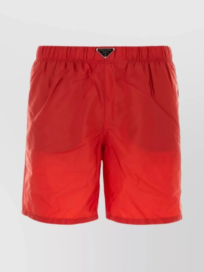 Prada Enamel-logo Swim Shorts In Red