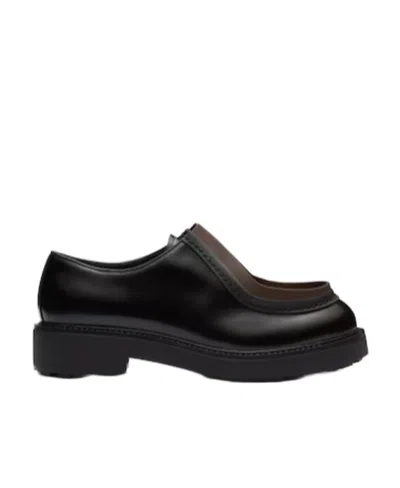 PRADA OPAQUE BRUSHED LEATHER LACE-UP SHOES