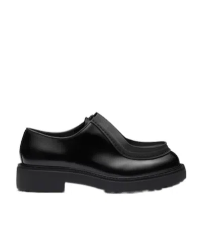 Prada Leather Lace-up Shoes With Chunky Sole And Logoed Rubber Inserts In Black