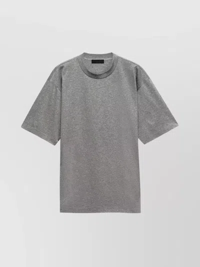 PRADA OVERSIZE CREW NECK T-SHIRT WITH SQUARED SILHOUETTE