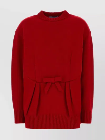 PRADA OVERSIZED KNIT SWEATER WITH BOW AND PLEATS