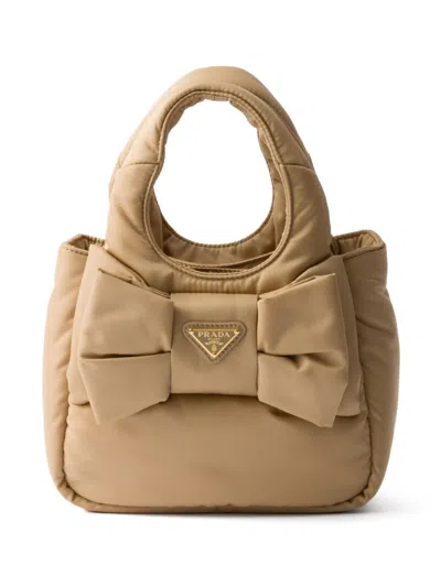 Prada Padded Re-nylon Mini-bag With Bow In Camel Brown