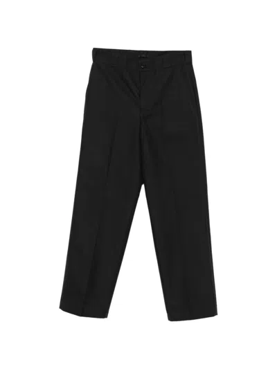 Prada Pressed-crease Logo-plaque Trousers In Black