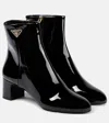 Prada Tronchetti Block Heel Bootie In Black