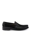 Prada Patent Leather Logo Loafers In Black