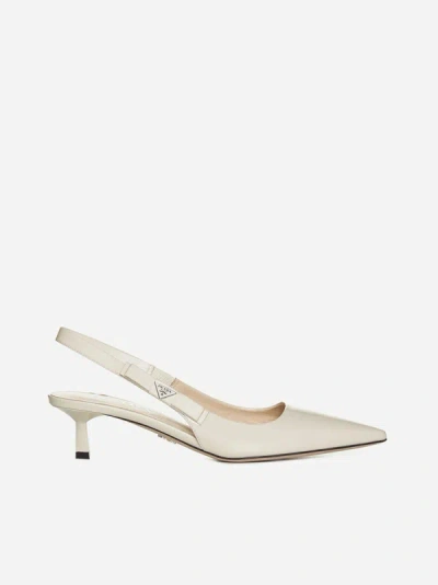 Prada Patent Bow Slingback Pumps In Ivory