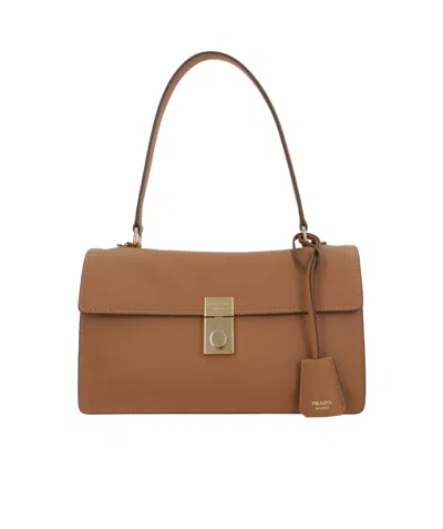 Prada Pendant Shoulder Bag In Brown