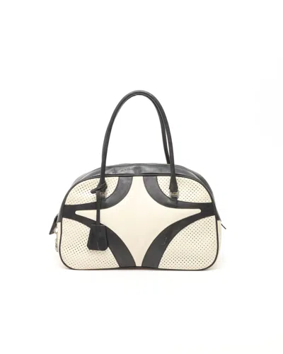 Prada Perforated Bowling Bag In Black