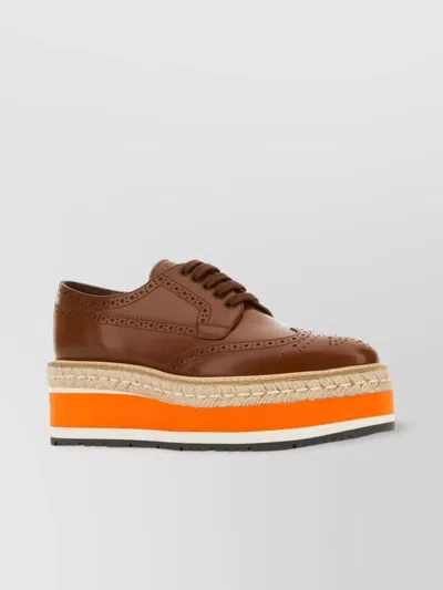 PRADA PLATFORM SOLE LEATHER LACE-UP SNEAKERS