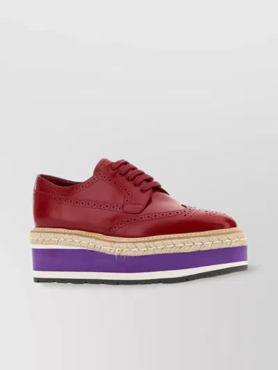 PRADA PLATFORM SOLE LEATHER LACE-UP SNEAKERS
