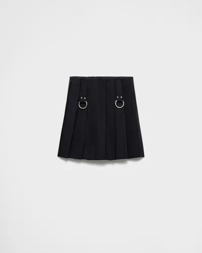 PRADA FALTEN-MINIROCK AUS GABARDINE MIT RINGEN AUS METALL