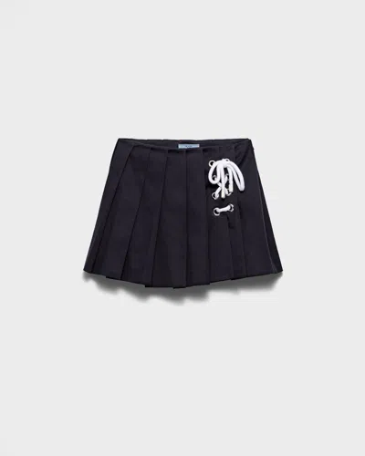 PRADA PLEATED STRETCH DRILL MINISKIRT