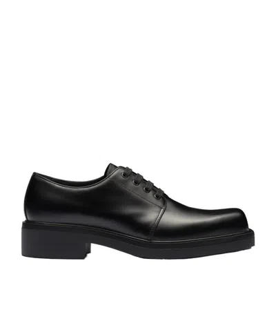 Prada Polished Leather Derby Shoes In Black