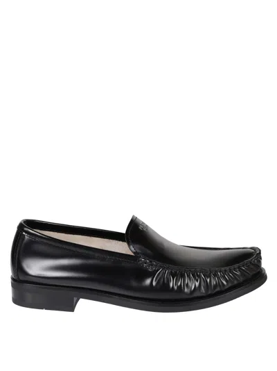 Prada Polished Leather Flat Shoes In Black