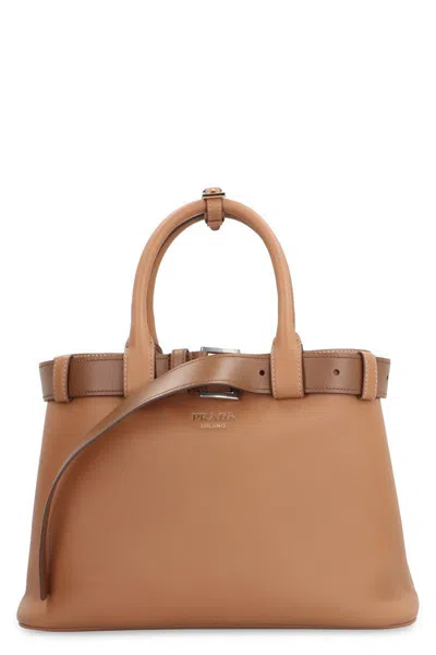 Prada Buckle Leather Bag In Saddle Brown