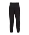Prada Pressed-crease Velvet Tapered Trousers In Black