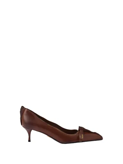 PRADA PRADA PUMPS IN ANTIQUED LEATHER WITH EXPOSED STITCHING AND RAW EDGES